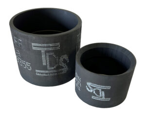 Two TDS cylindrical pipes or hoses, one marked FF 9055 and Tube Max
