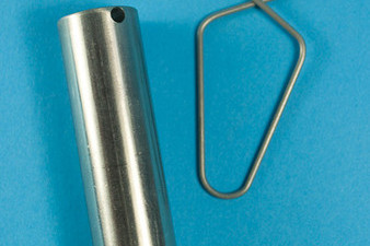 a silver tube and clip