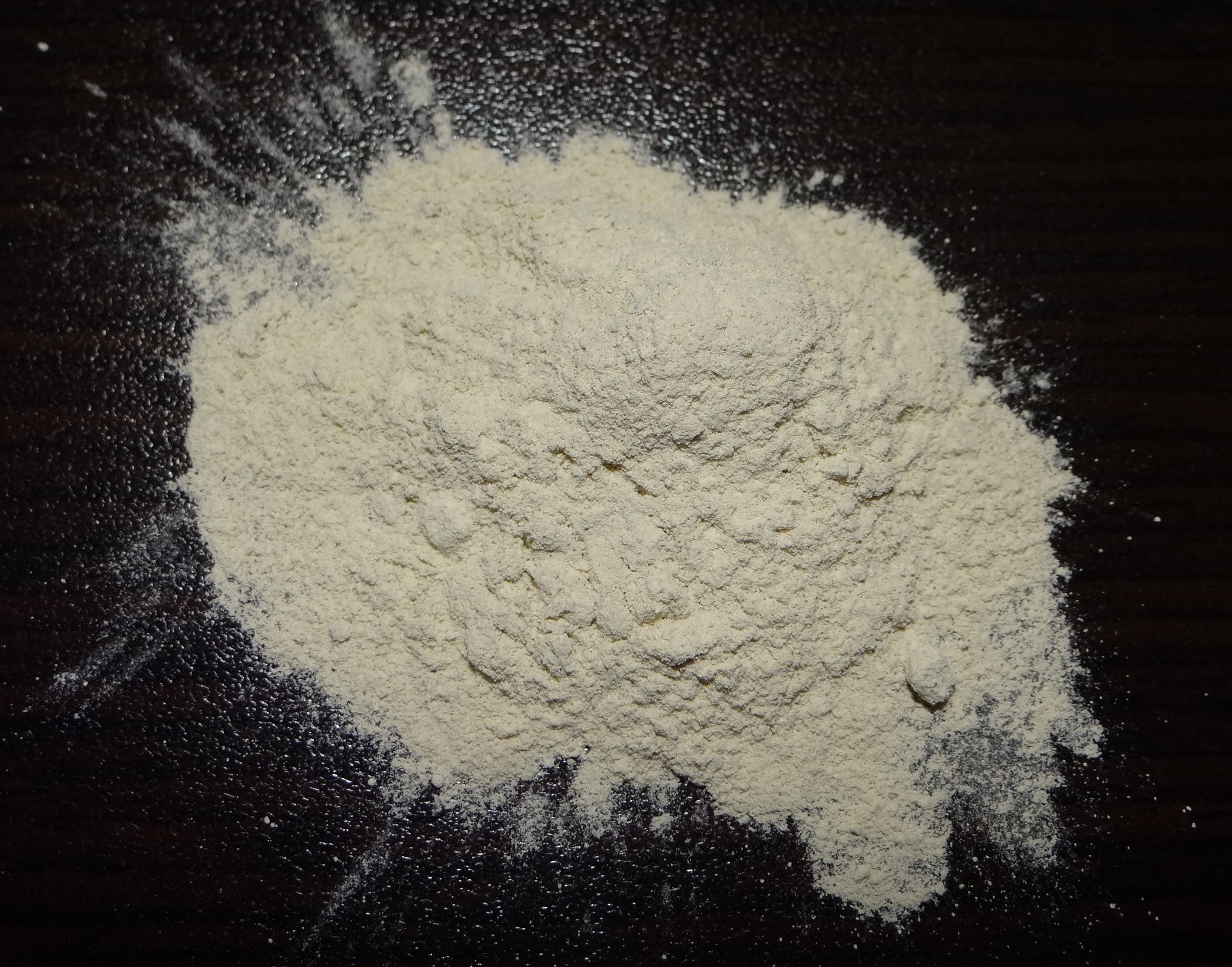 a pile of enviroplug grout powder